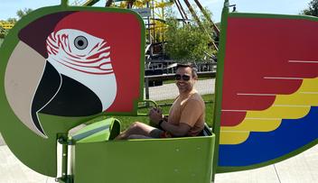 Ross riding a fair ride