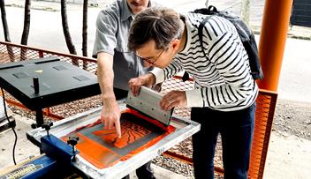 Ologists creating a tote bag