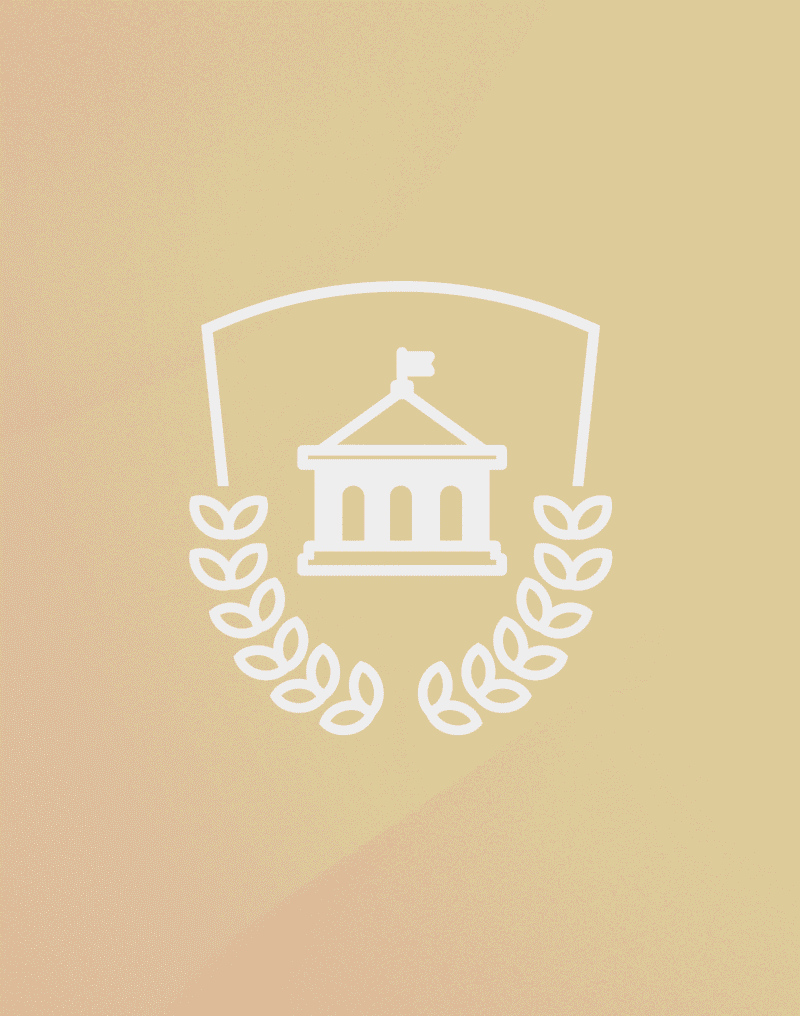 Stylized academic crest icon featuring a classical campus building with a flag, framed by a shield outline and laurel wreath, set against a soft beige gradient background.